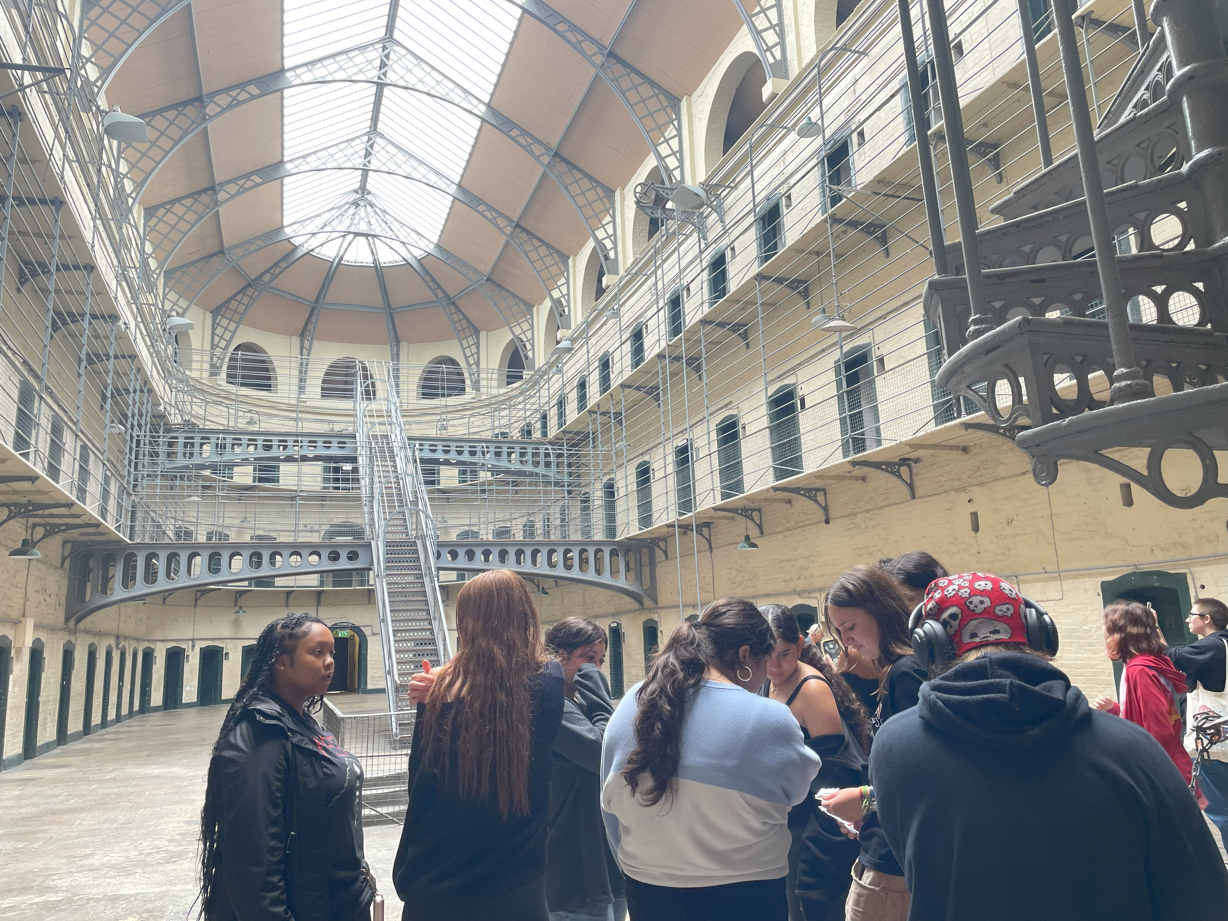 Educational tour group learning about history